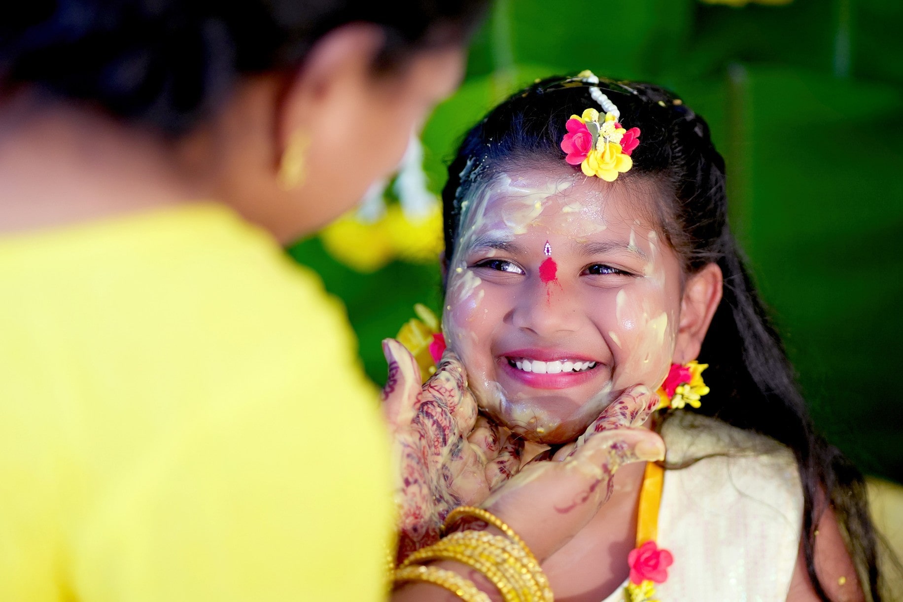 A colorful hot air balloon soaring above hills