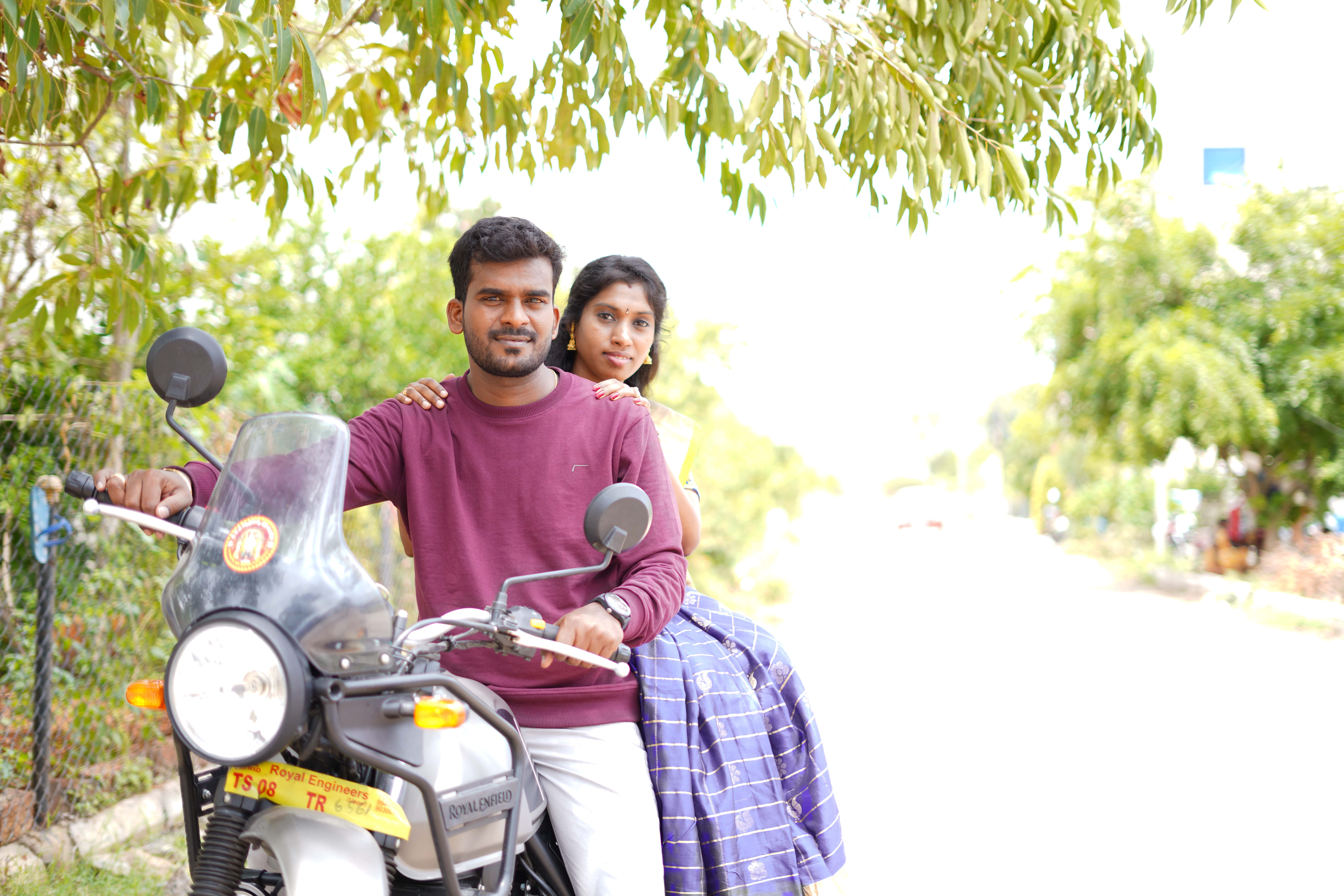 A small boat on a lake with a mountain backdrop